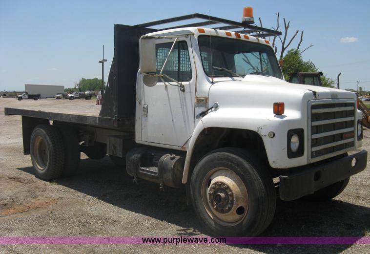 image for item A6429 1988 International S1700 flatbed dump truck