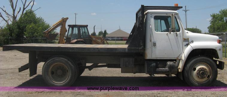 image for item A6429 1988 International S1700 flatbed dump truck