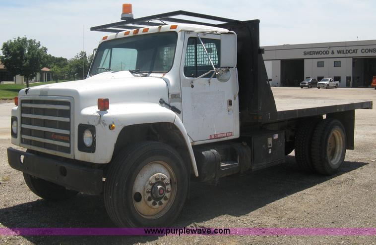 image for item A6429 1988 International S1700 flatbed dump truck