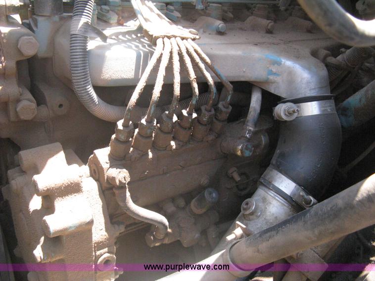 image for item A6429 1988 International S1700 flatbed dump truck