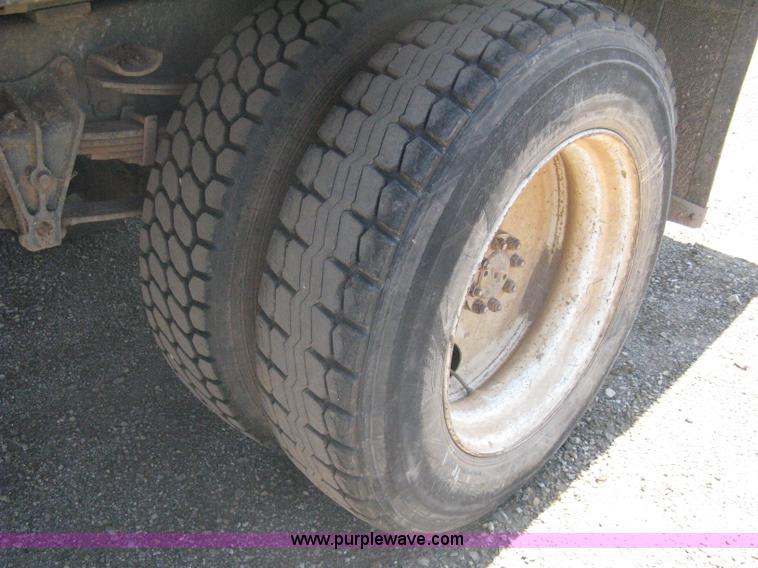 image for item A6429 1988 International S1700 flatbed dump truck