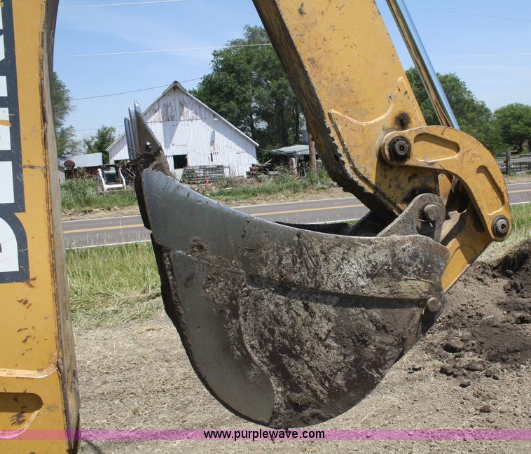 image for item B6753 2002 John Deere 310SG backhoe