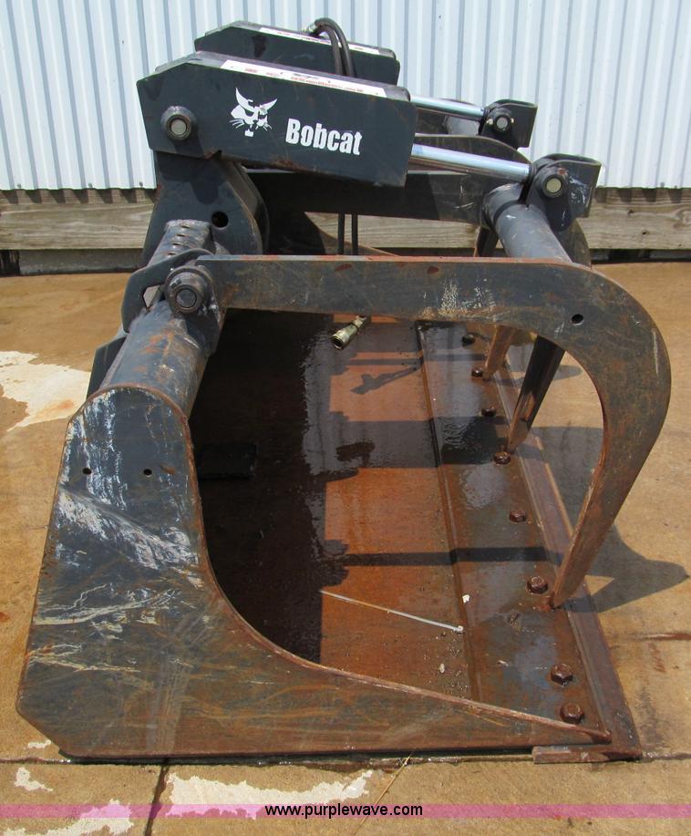 Bobcat skid steer grapple bucket in Lees Summit, MO Item C2227 sold