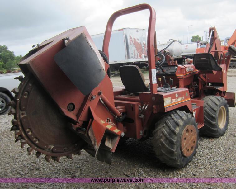 image for item D2015 Ditch Witch 4500 trencher with rock saw and backhoe attachments