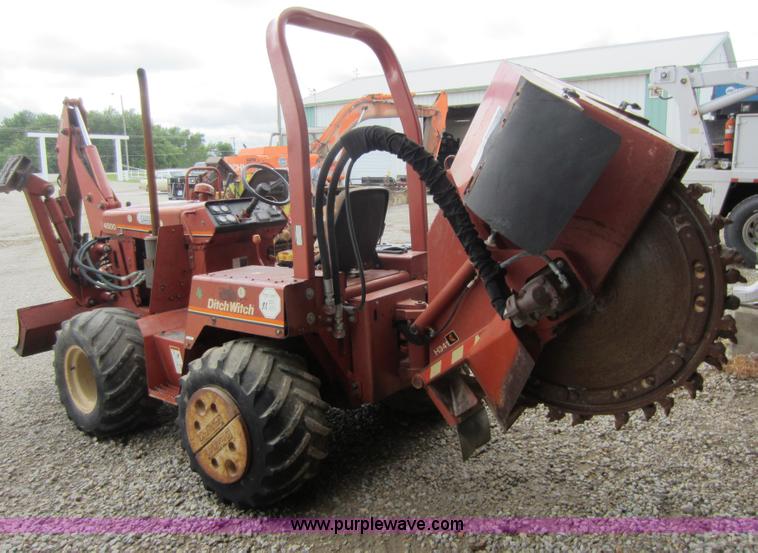 image for item D2015 Ditch Witch 4500 trencher with rock saw and backhoe attachments