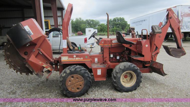 image for item D2015 Ditch Witch 4500 trencher with rock saw and backhoe attachments