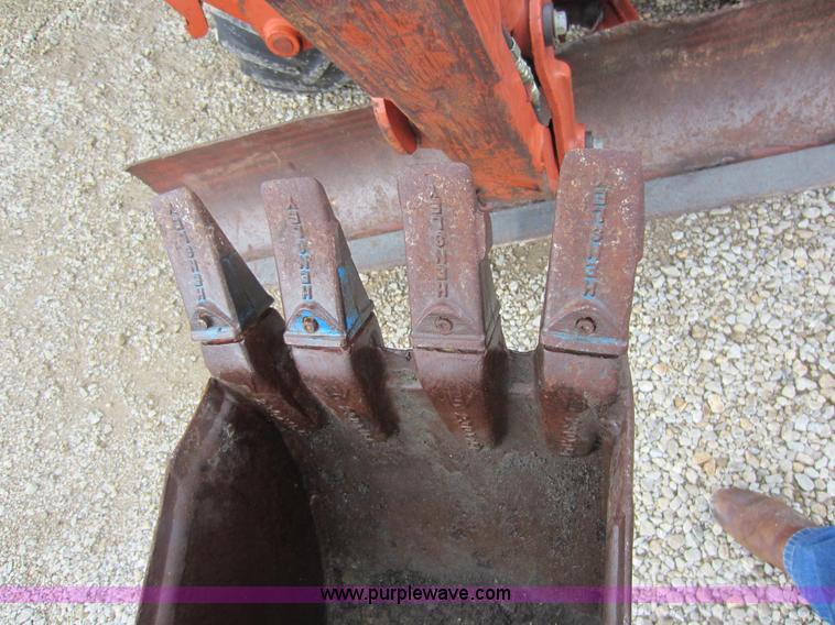 image for item D2015 Ditch Witch 4500 trencher with rock saw and backhoe attachments