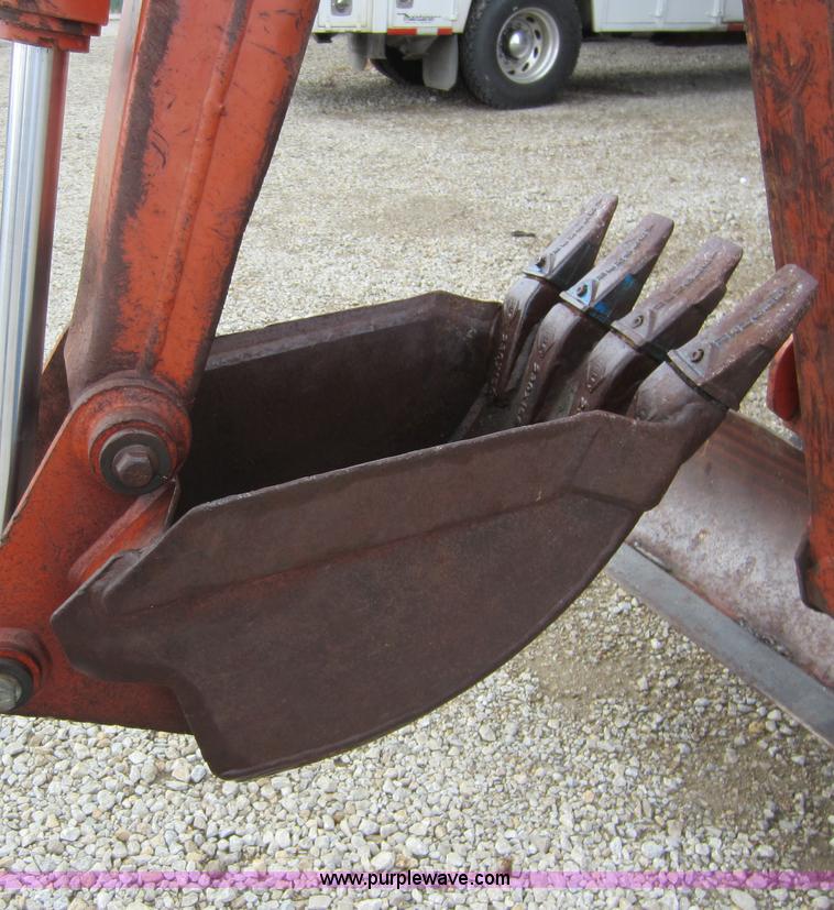 image for item D2015 Ditch Witch 4500 trencher with rock saw and backhoe attachments