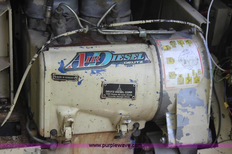image for item D7833 Ingersoll Rand 100 portable air compressor