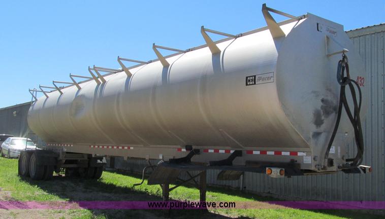 image for item A8329 2003 CEI Pacer AT35ML tandem axle trailer