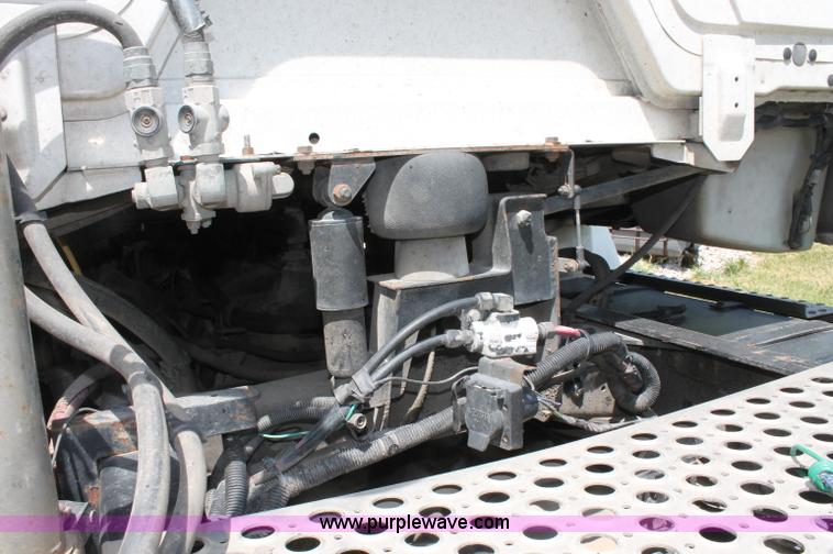 image for item C2556 2000 Freightliner FL70 semi truck