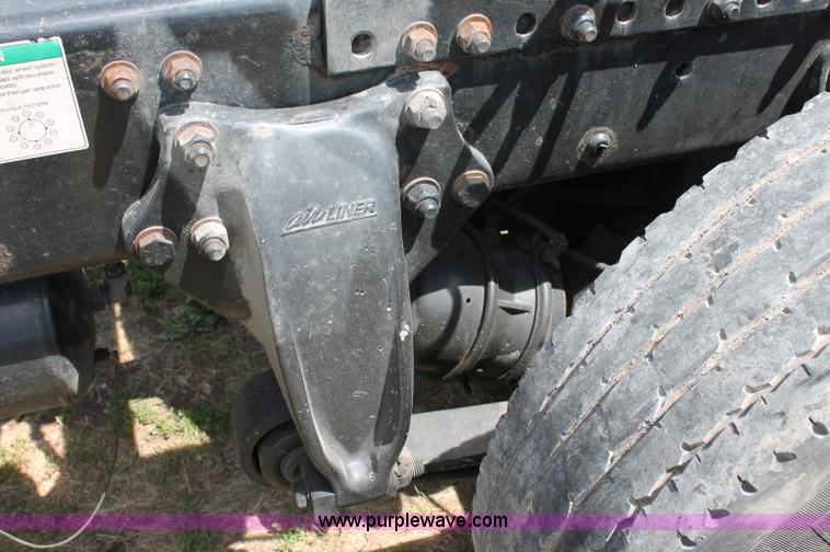 image for item C2556 2000 Freightliner FL70 semi truck