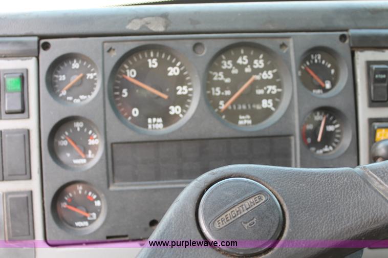 image for item C2556 2000 Freightliner FL70 semi truck