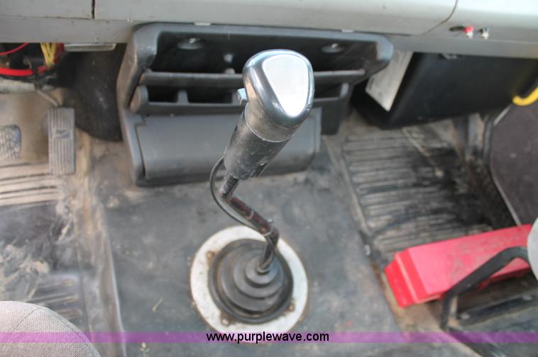 image for item C2556 2000 Freightliner FL70 semi truck