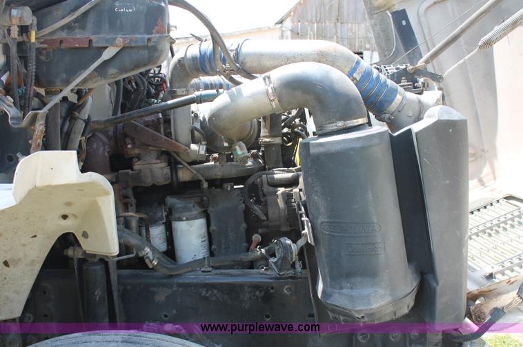 image for item C2556 2000 Freightliner FL70 semi truck