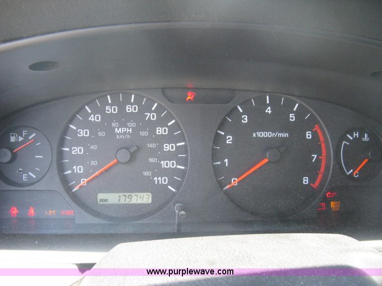 image for item A6459 2001 Nissan Frontier XE crew cab pickup truck