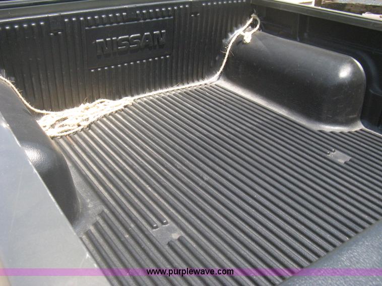 image for item A6459 2001 Nissan Frontier XE crew cab pickup truck