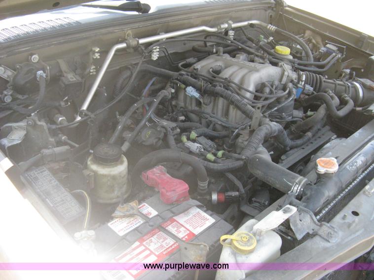 image for item A6459 2001 Nissan Frontier XE crew cab pickup truck