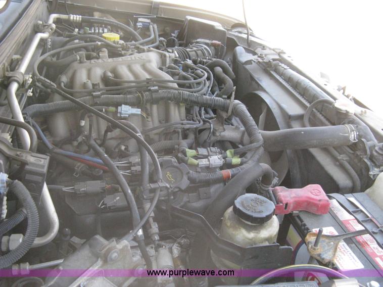 image for item A6459 2001 Nissan Frontier XE crew cab pickup truck