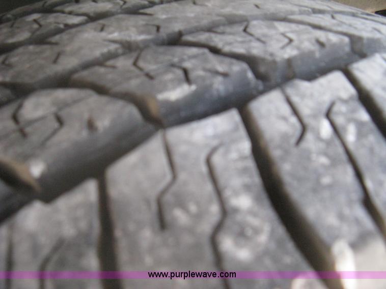 image for item A6459 2001 Nissan Frontier XE crew cab pickup truck