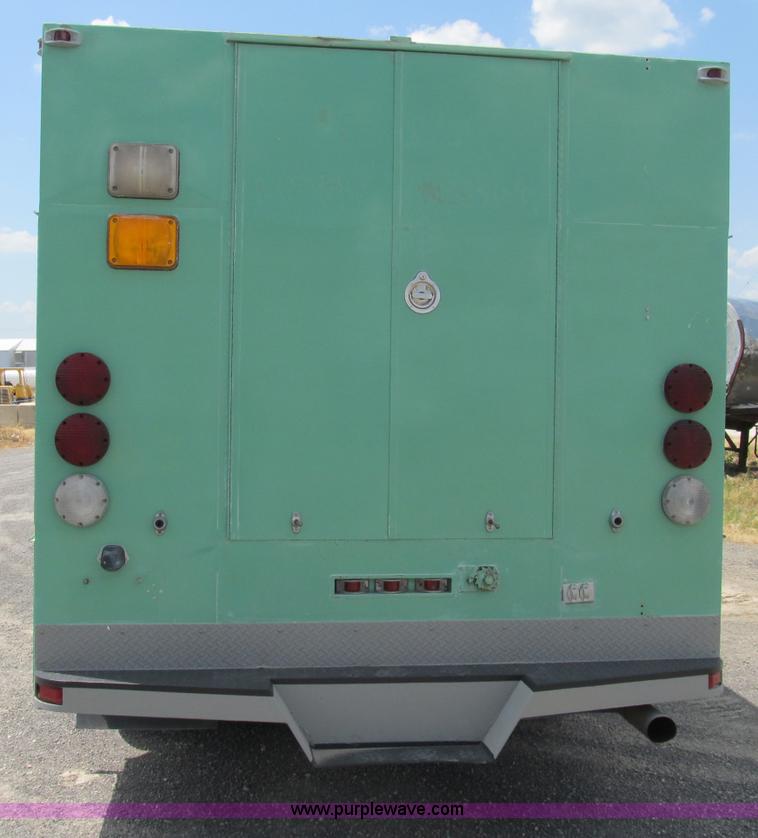 image for item B2740 1995 Ford F800 extended cab utility transport truck