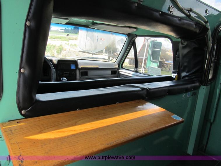 image for item B2740 1995 Ford F800 extended cab utility transport truck