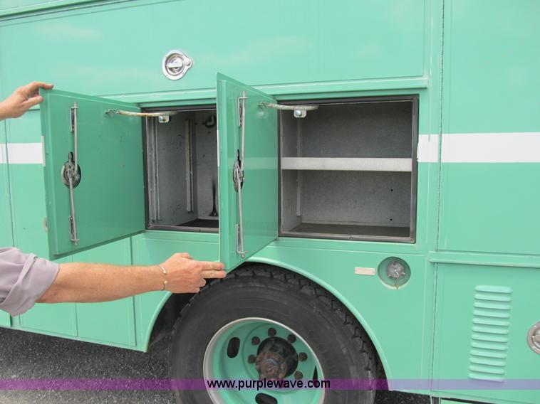 image for item B2740 1995 Ford F800 extended cab utility transport truck