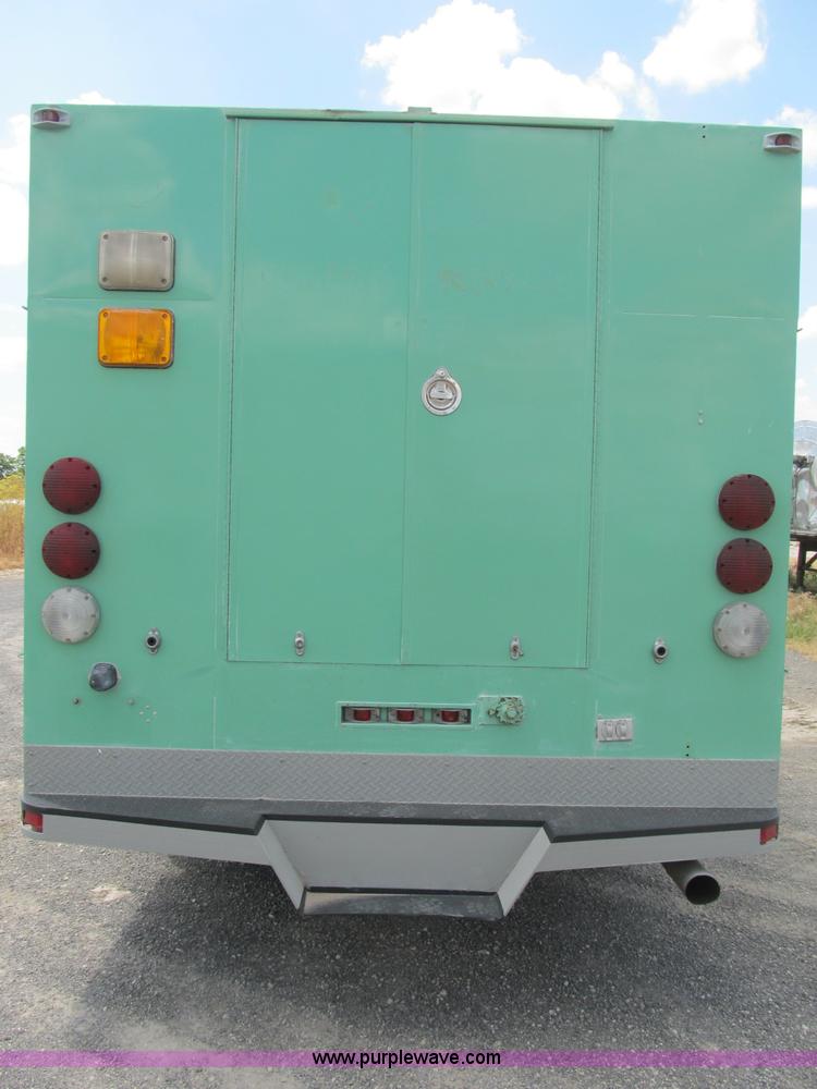 image for item B2740 1995 Ford F800 extended cab utility transport truck