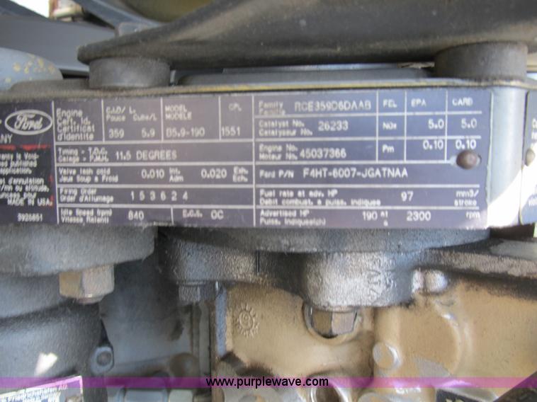 image for item B2740 1995 Ford F800 extended cab utility transport truck