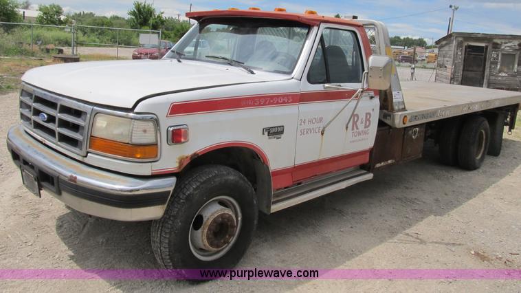 image for item B2744 1995 Ford F450 XLT Super Duty roll back truck