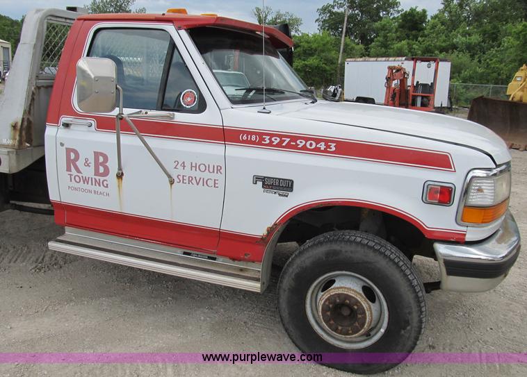 image for item B2744 1995 Ford F450 XLT Super Duty roll back truck