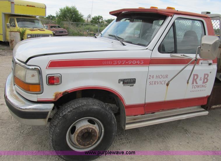 image for item B2744 1995 Ford F450 XLT Super Duty roll back truck