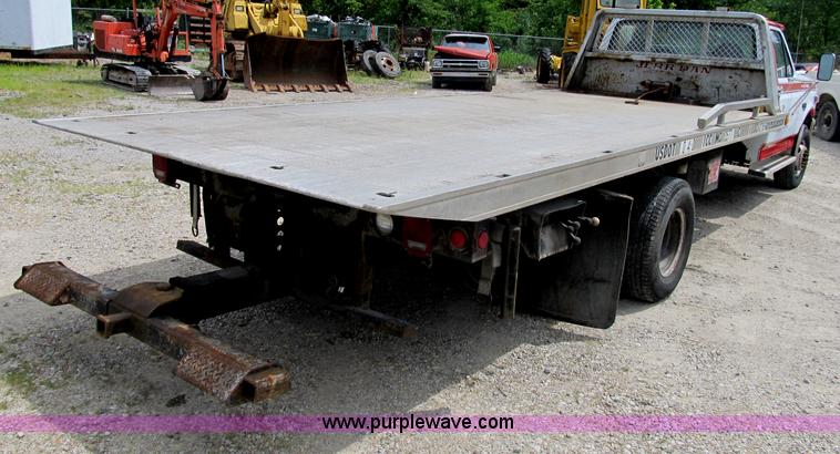 image for item B2744 1995 Ford F450 XLT Super Duty roll back truck