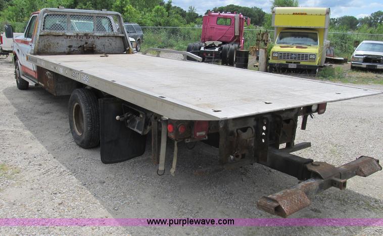 image for item B2744 1995 Ford F450 XLT Super Duty roll back truck