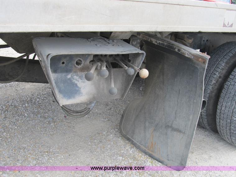 image for item B2744 1995 Ford F450 XLT Super Duty roll back truck