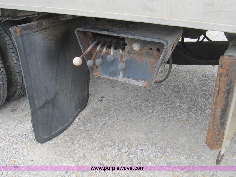 image for item B2744 1995 Ford F450 XLT Super Duty roll back truck