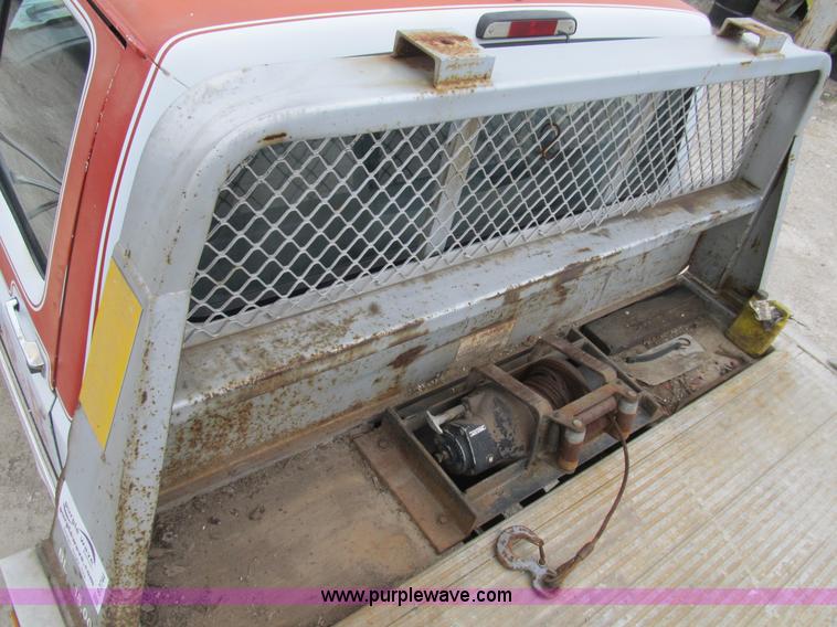 image for item B2744 1995 Ford F450 XLT Super Duty roll back truck