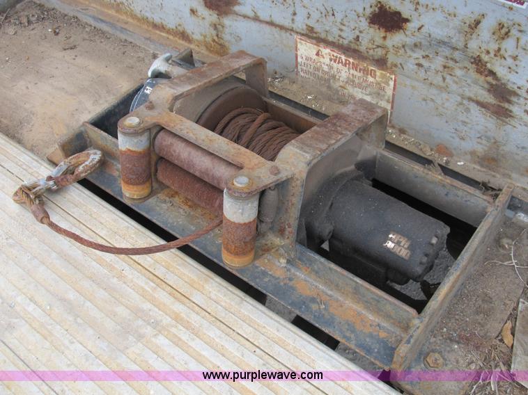 image for item B2744 1995 Ford F450 XLT Super Duty roll back truck