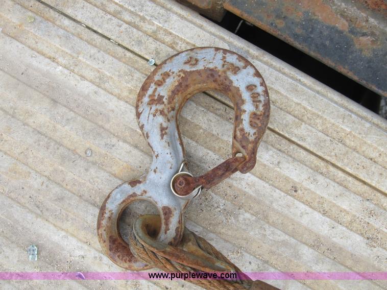 image for item B2744 1995 Ford F450 XLT Super Duty roll back truck