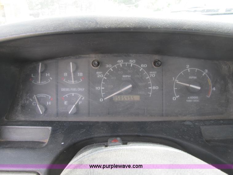 image for item B2744 1995 Ford F450 XLT Super Duty roll back truck