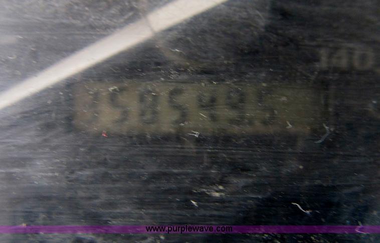 image for item B2744 1995 Ford F450 XLT Super Duty roll back truck