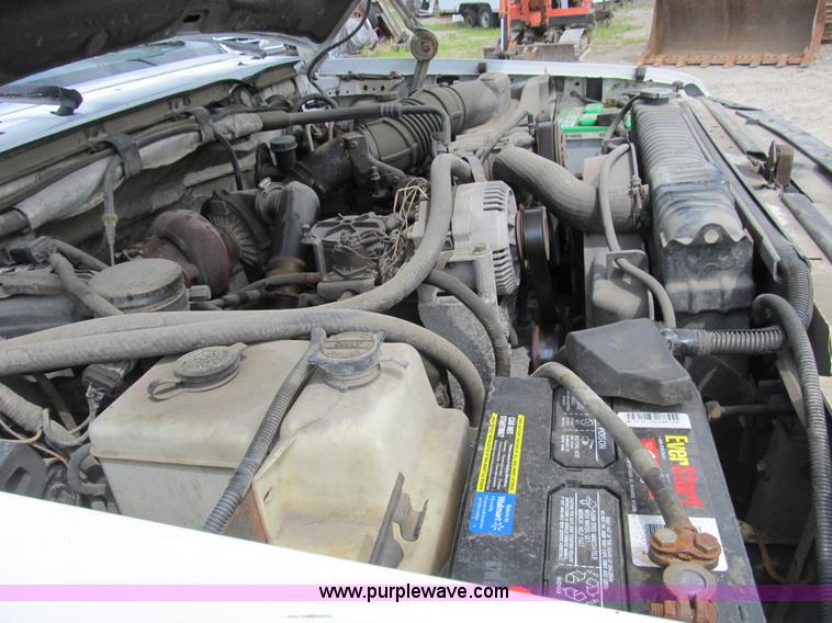 image for item B2744 1995 Ford F450 XLT Super Duty roll back truck