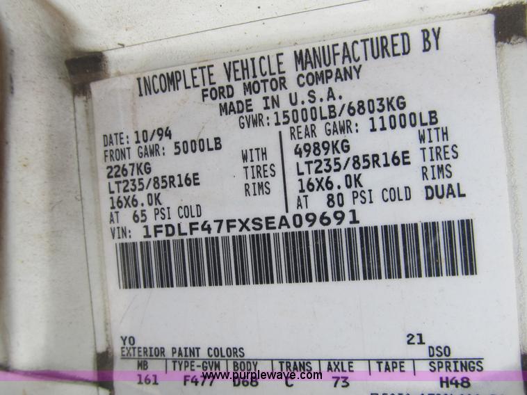 image for item B2744 1995 Ford F450 XLT Super Duty roll back truck