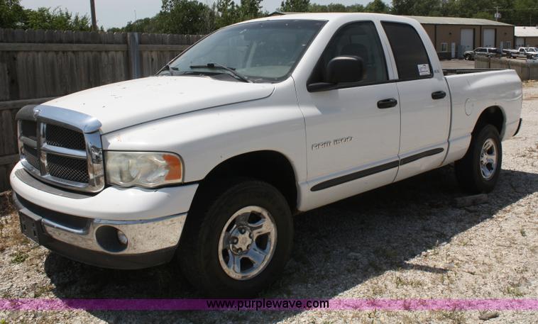 image for item B6664 2002 Dodge Ram 1500 quad cab pickup truck