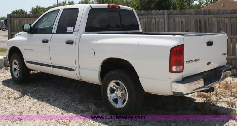 image for item B6664 2002 Dodge Ram 1500 quad cab pickup truck