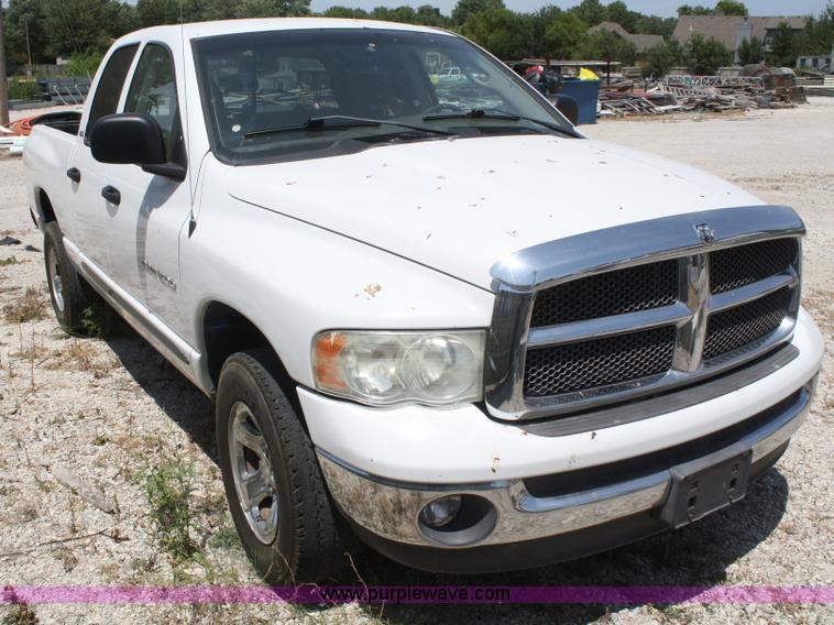 image for item B6664 2002 Dodge Ram 1500 quad cab pickup truck