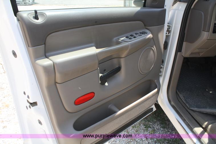 image for item B6664 2002 Dodge Ram 1500 quad cab pickup truck