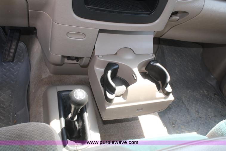 image for item B6664 2002 Dodge Ram 1500 quad cab pickup truck