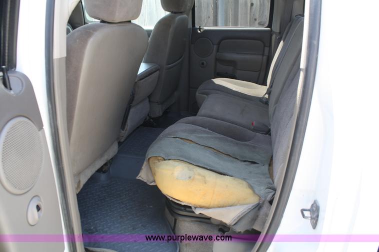 image for item B6664 2002 Dodge Ram 1500 quad cab pickup truck