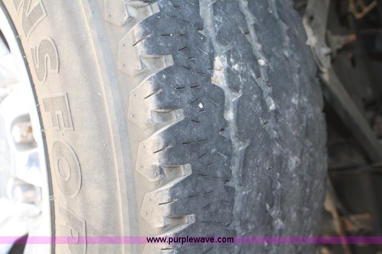 image for item B6664 2002 Dodge Ram 1500 quad cab pickup truck